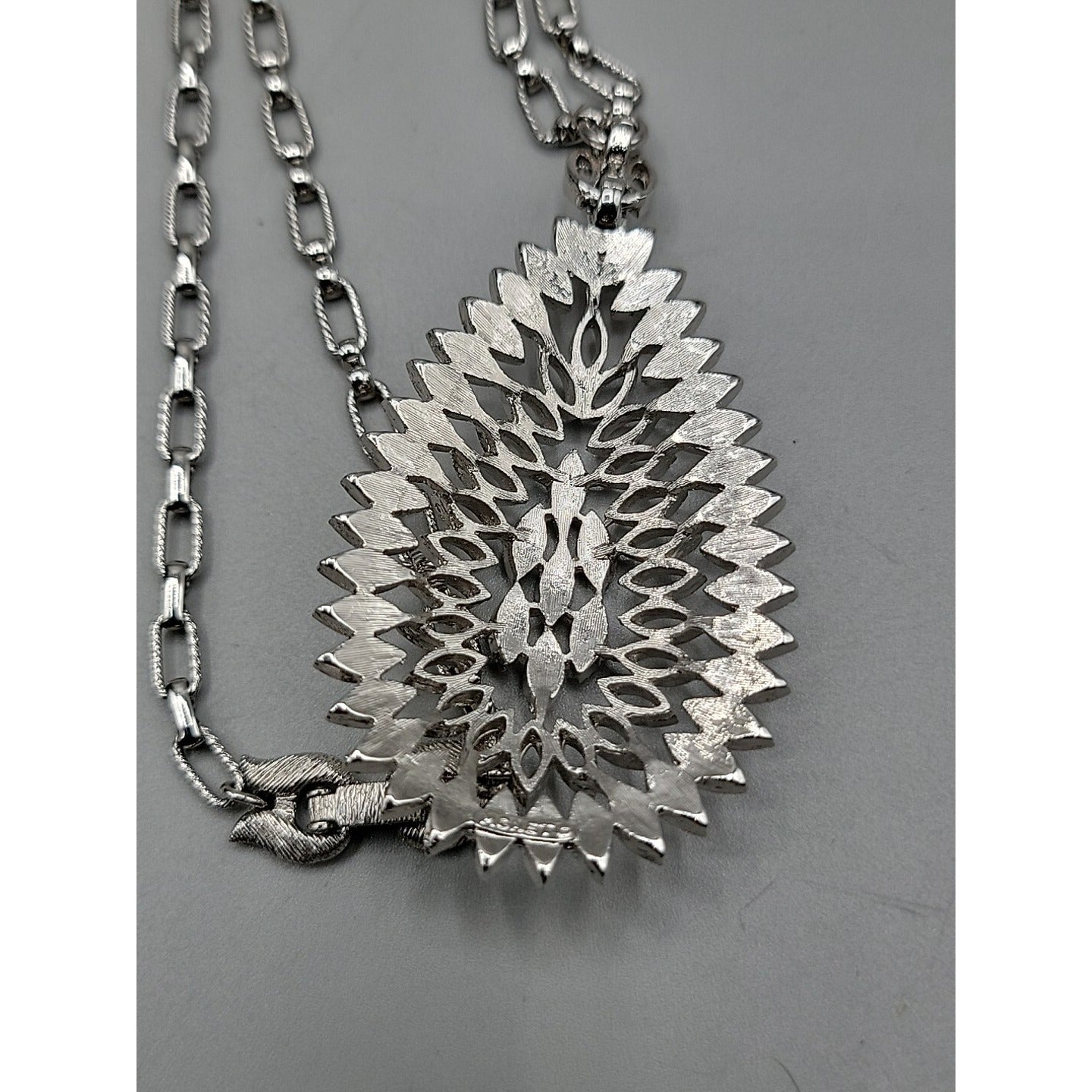 Monet Pendant Necklace Signed Open Metal Work 30" Silver Tone Chain