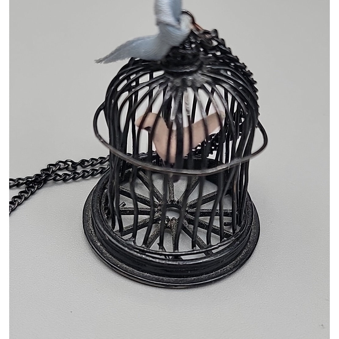 Freedom Bird Pendant Necklace 30" Black Tone Swinging Pink Wood Bird Metal Cage