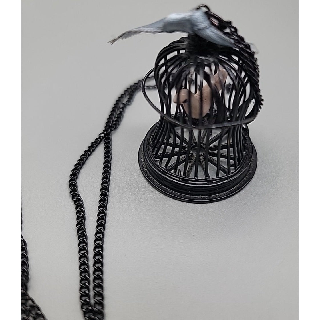 Freedom Bird Pendant Necklace 30" Black Tone Swinging Pink Wood Bird Metal Cage